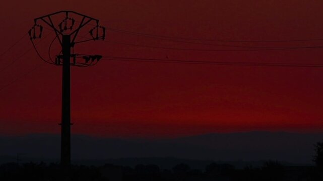 Beautiful red Sunset with Electrical Pole and Wires, Sun Setting in 8 Seconds, Timelapse no sound