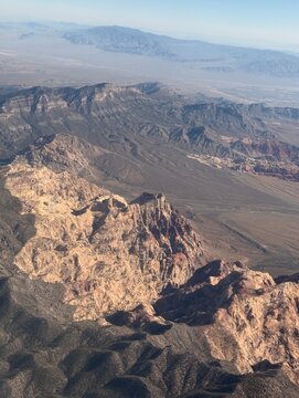 Aerial view of the Aztec Sandstone cliffs and Keystone Thrust geology at Red Rock Canyon National Conservation Area near Las Vegas, Nevada