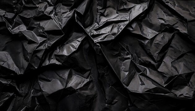 Textured Crumpled Black Paper Background