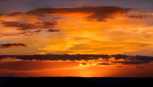 Panoramic Sunset Sky With Warm Golden Orange Hues And A Dark Band Of Clouds On The Horizon Romantic Evening Landscape