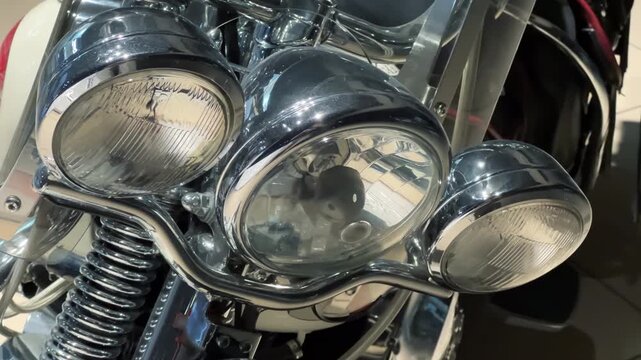 Chrome Motorcycle Headlights Close-Up | Vintage Cruiser Bike Front Lights with Parallax Camera Motion | Classic Chopper Motorbike Detail Indoors