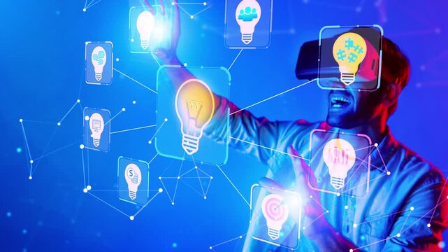 Young man wearing virtual reality headset interacts with light bulb icons and digital elements in a futuristic tech environment. Entropy.