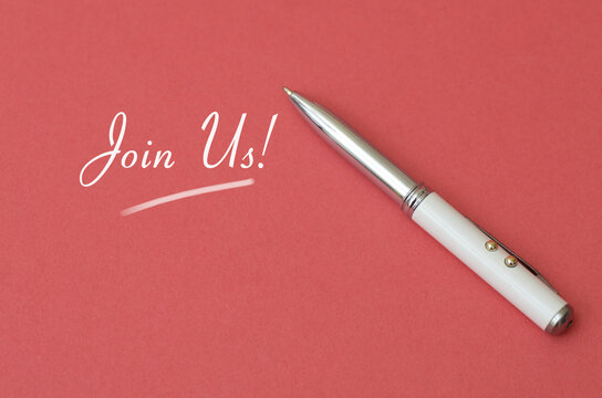 Join Us text written on red background with white pen call to action for recruitment or membership