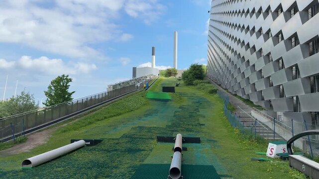 Exterior view of CopenHill artificial ski slope in Copenhagen city, Denmark