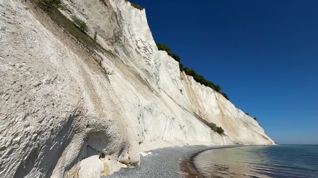 White chalk cliffs, beach and sea at Mons Klint landmark, Denmark