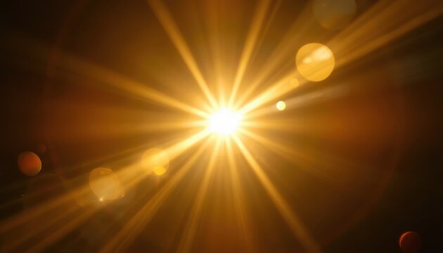 Sunlight glows intensely with a vibrant golden lens flare effect against a dark background.