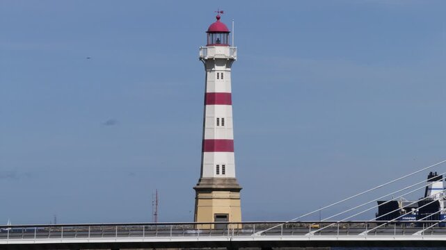 Old lighthouse building in Malmo city harbor, Sweden