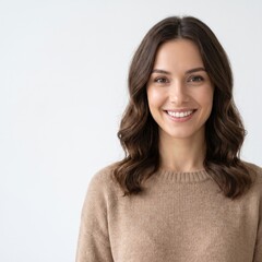 Obraz premium Young Brunette Woman Smiling Naturally in a Studio Setting Exuding Confidence as a Corporate Professional Embracing Personal Freedom in a Creative Environment Achieving Success Through Innovation