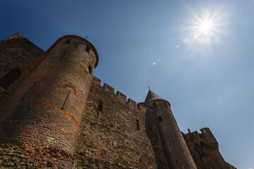 Moon lights the castle walls in Carcassonne, France © Pete Niesen Photo