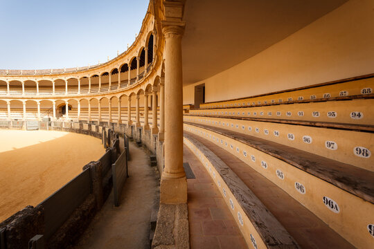 Closeup of  bench seating, safety ring at empty bullfight arena