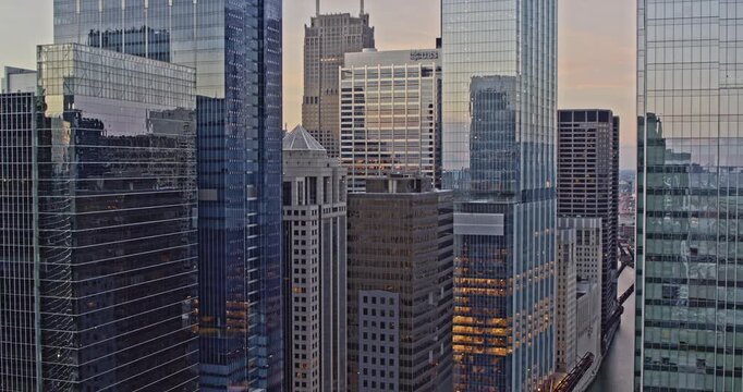 Chicago Illinois Aerial v12 daring drone fly through of the downtown cityscape at dawn, dramatic cinematic footage - Shot with Inspire 2, X7 camera - August 2020