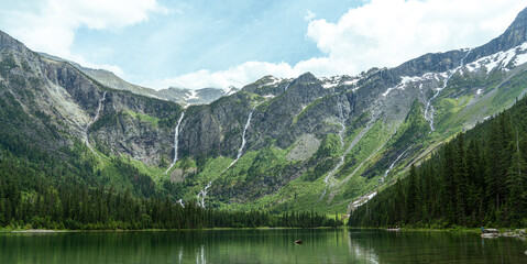 Waterfall Streaming Down Green Mountainside © Tianqi