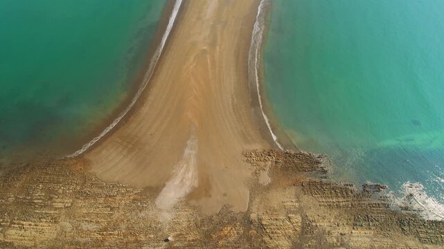 Overhead view of rocky reef at the tip of Whale Tail sandbar Uvita Beach Marino Ballena National Park Costa Rica