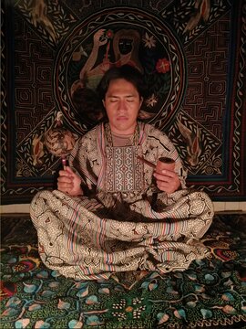 Model wearing Shipibo clothing during an ayahuasca session