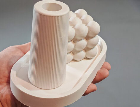 Minimalist White Concrete Candle Holder and Decorative Bubble Cube Displayed on Oval Tray