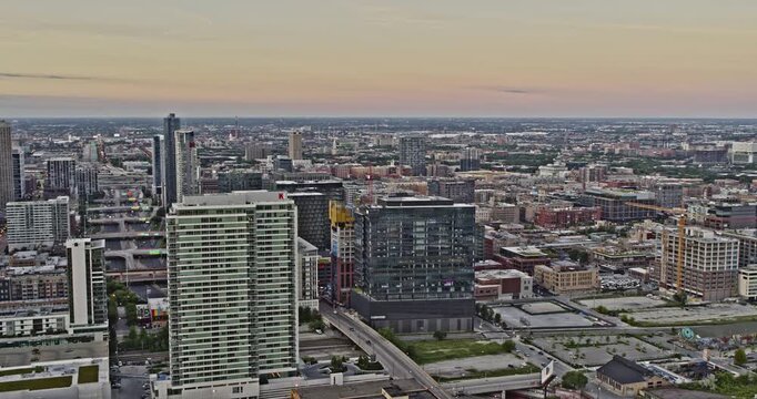 Chicago Illinois Aerial v17 cinematic sweeping view across the whole cityscape west loop and downtown with dramatic sunrise clouds - Shot with Inspire 2, X7 camera - August 2020