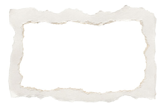 A ripped piece of paper with torn edges lies on a surface.