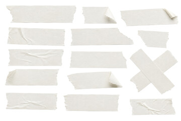 Fototapeta premium A collection of torn paper strips and an X-shaped piece arranged on a surface.