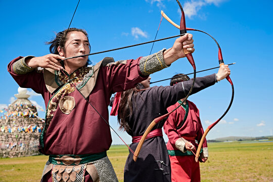 Mongolian archers at the Naadam Festival on the grasslands
