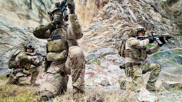 Special forces team establishes defensive positions during a military field exercise, demonstrating coordination and tactical readiness