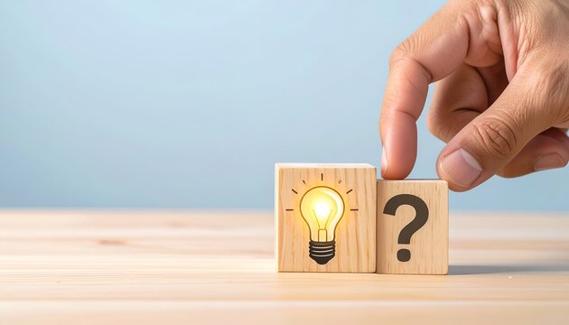 Hand moving a question block beside a glowing idea icon, illustrating solutions, innovation, and creative thinking.