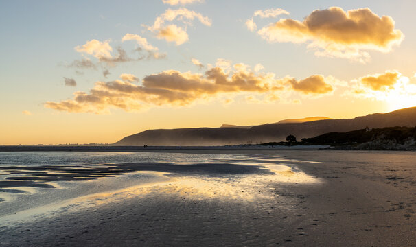 low tide at sunset and dusk, Grotto Beach, Hermanus, South Africa