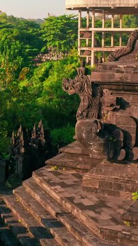 Bajra Sandhi or Monumen Taman Mumbul monument to the struggle for independence in the rays of the rising sun. Bali, Indonesia. 4K Aerial view