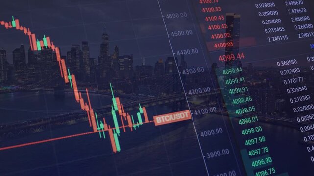 Glowing double exposure showing a downward trending BTC/USDT crypto candlestick chart overlaid on a sprawling city skyline at night, illustrating cryptocurrency market volatility and loss.