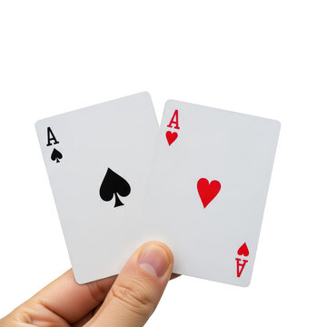 Hand holding three playing cards with ace of spades and red aces