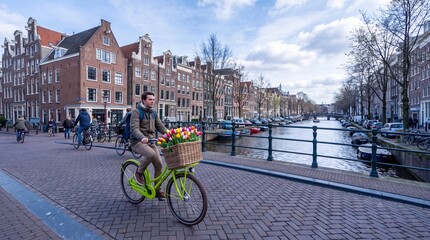 Fototapeta premium Man Cycling with Colorful Tulips in Amsterdam Canal District - Iconic Dutch Lifestyle