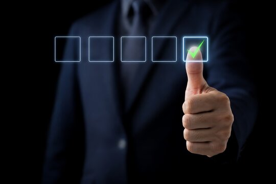 Businessman giving thumbs up with five star rating interface on dark background