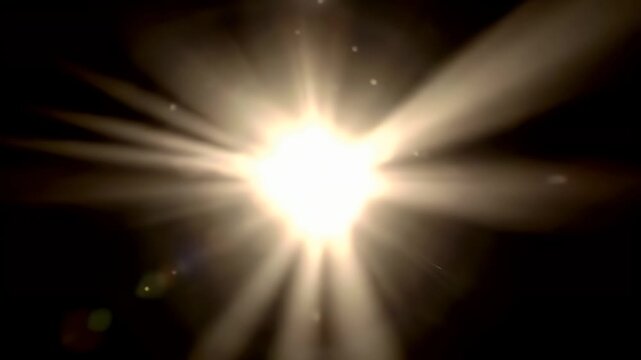A bright sunburst effect with lens flares and bokeh.
