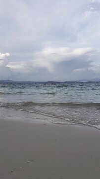 Calm Ocean Waves on a Sandy Beach