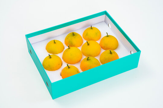 Fresh oranges on a white background