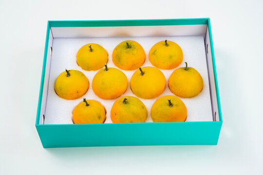Fresh oranges on a white background