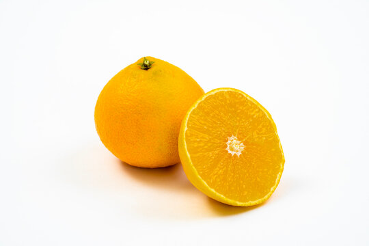 Fresh oranges on a white background