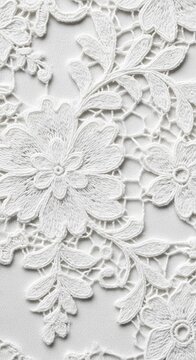Elegant white cotton lace fabric featuring delicate floral patterns. A soft textile background highlighting fine craftsmanship and texture, white, lace, textile