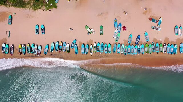 Aerial view of fishing boats on sandy beach at Nilaveli, Sri Lanka