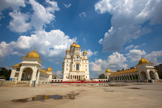 Wide angle view of the Romanian Peoples Salvation Cathedral and complex with water reflection in Bucharest Romania