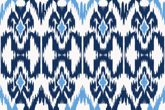 Abstract Indigo and Light Blue Ikat Seamless Pattern on White. Traditional Oriental Damask Geometric Boho Mediterranean Ethnic Textile Vector Ornament for Fashion Fabric, Wallpaper, and Decor Print.