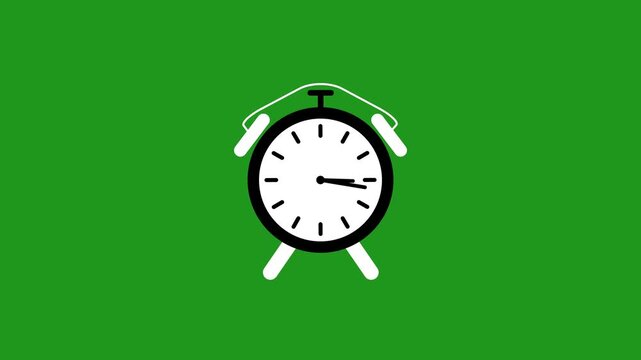 Black and white alarm clock on green background time