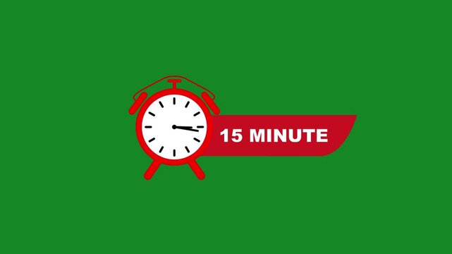 Red alarm clock with 15 minute text on green background white clock face black hands