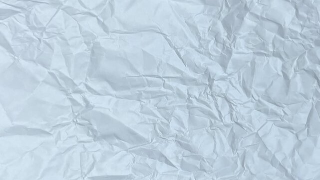 Abstract stop motion of crumpled white paper texture animated background loop