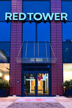 Lodz, Ł&oacute;dź, Poland, Europe - 02.2026 : Red Tower, formerly Bre Tower skyscraper, presently business complex with Credit Agricole Bank world's largest cooperative financial institution, Piotrkowska str
