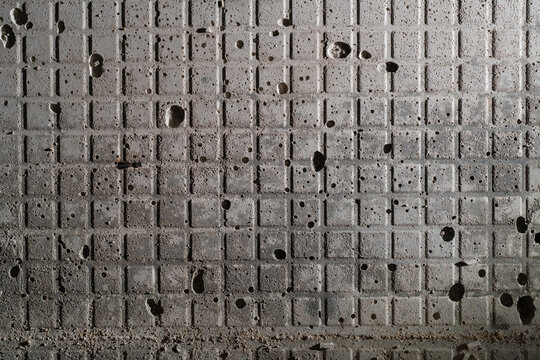 Industrial Grunge Gridded Gray Concrete Wall Texture with Weathered Cement Panel Lines