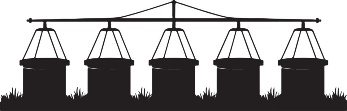 Silhouette of five hay bales on a hay trolley black and white