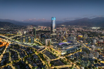 Fototapeta premium Aerial view of the nighttime skyline of Santiago, Chile