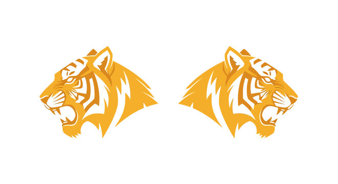 Two Golden Tiger Heads Facing Opposite Directions.