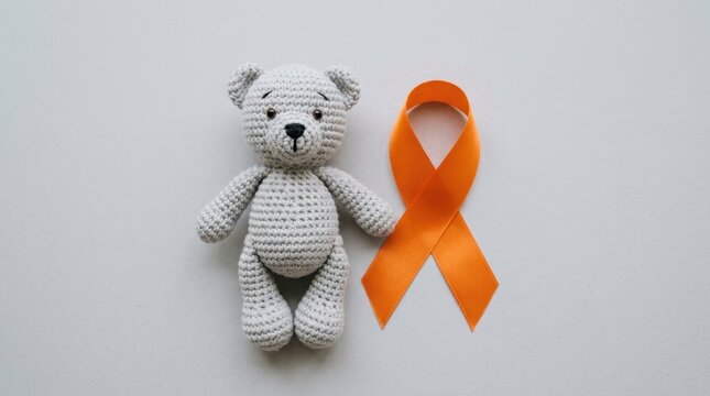 Cute Gray Crocheted Amigurumi Teddy Bear with Orange Awareness Ribbon for Childhood Leukemia, Kidney Cancer, ADHD, and Multiple Sclerosis Awareness