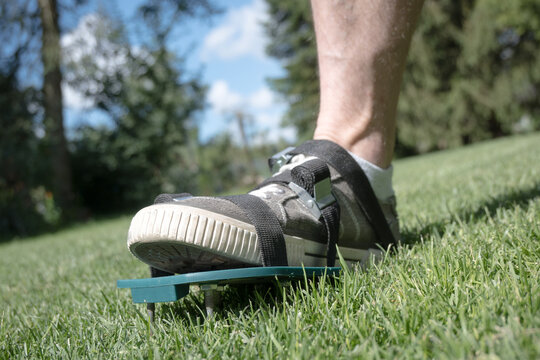 Lawn aeration using shoe attachments.
